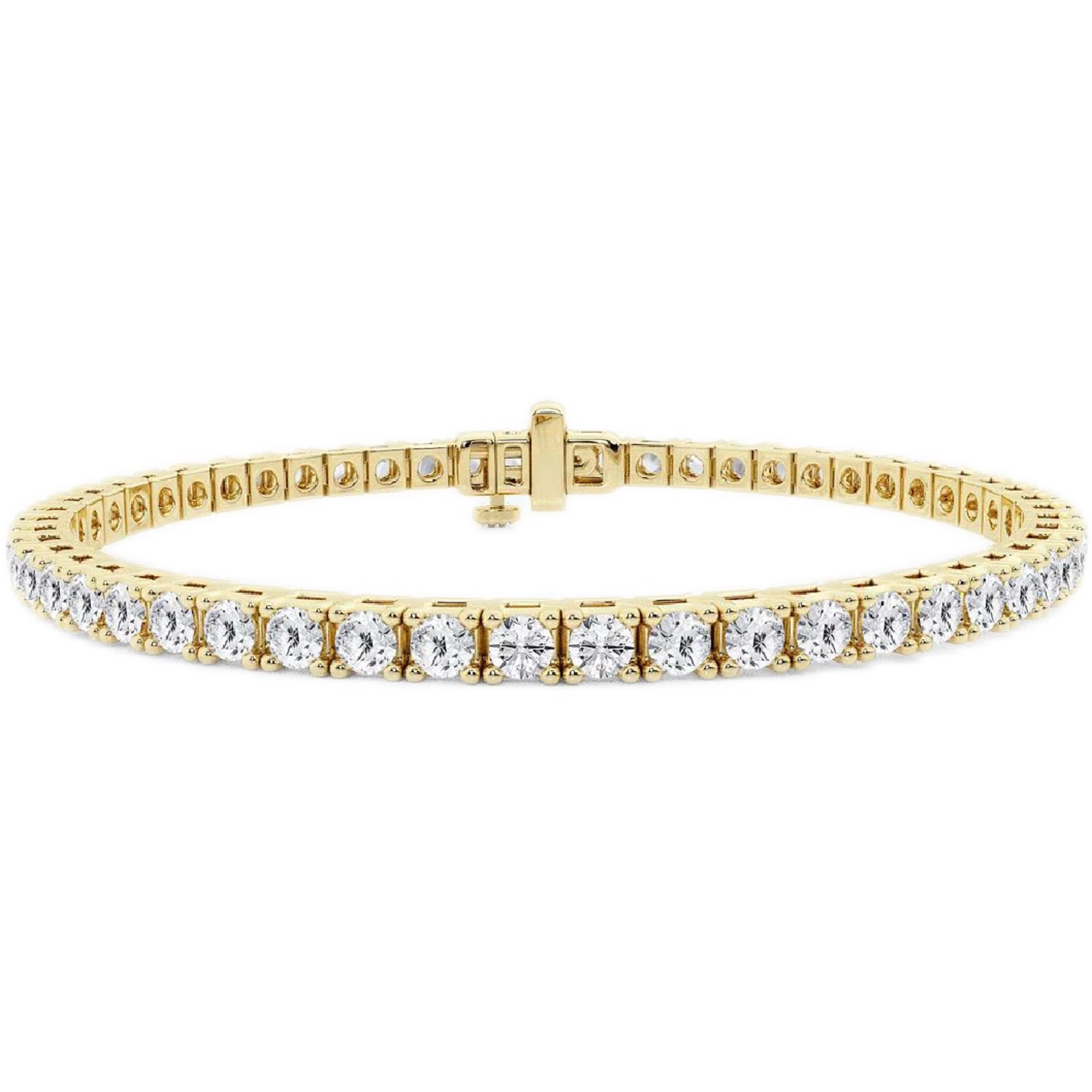Gold bracelet with clear gemstones on a white background