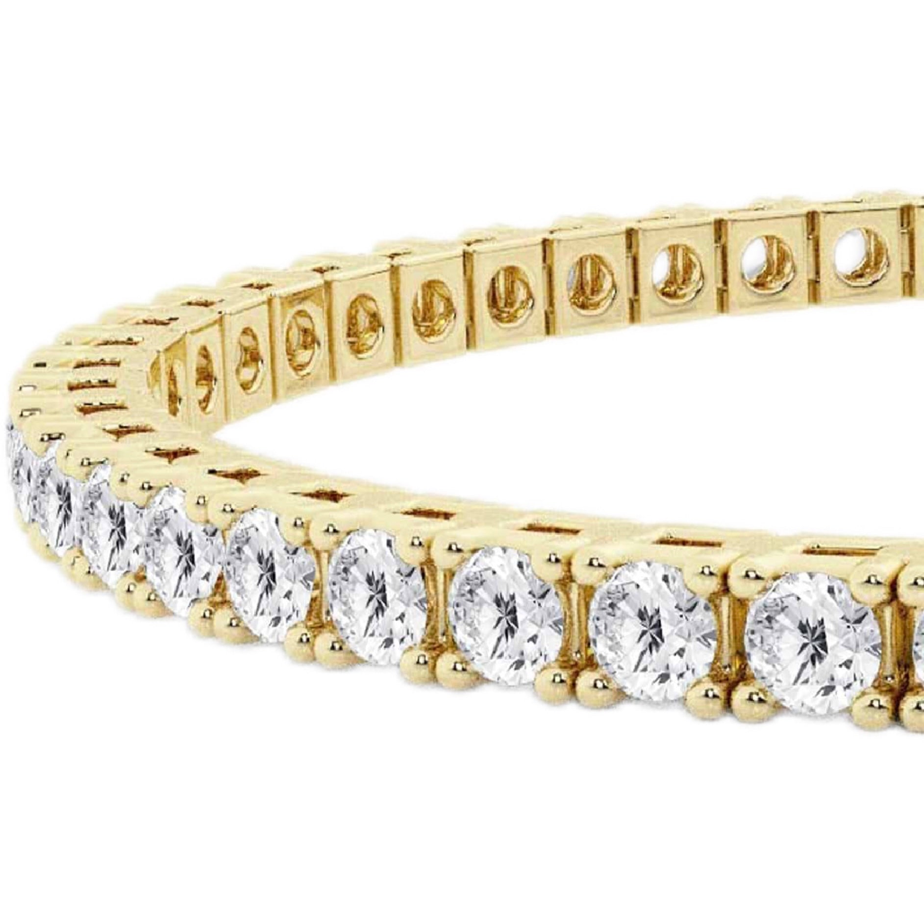 Gold bracelet with clear gemstones on a white background